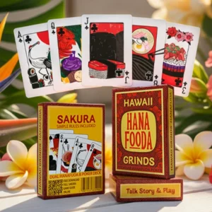 A hybrid poker deck, limited edition featuring tropical flowers in the background on a white table, and showing some key face cards for the hawaiian sakura game of hanafuda.